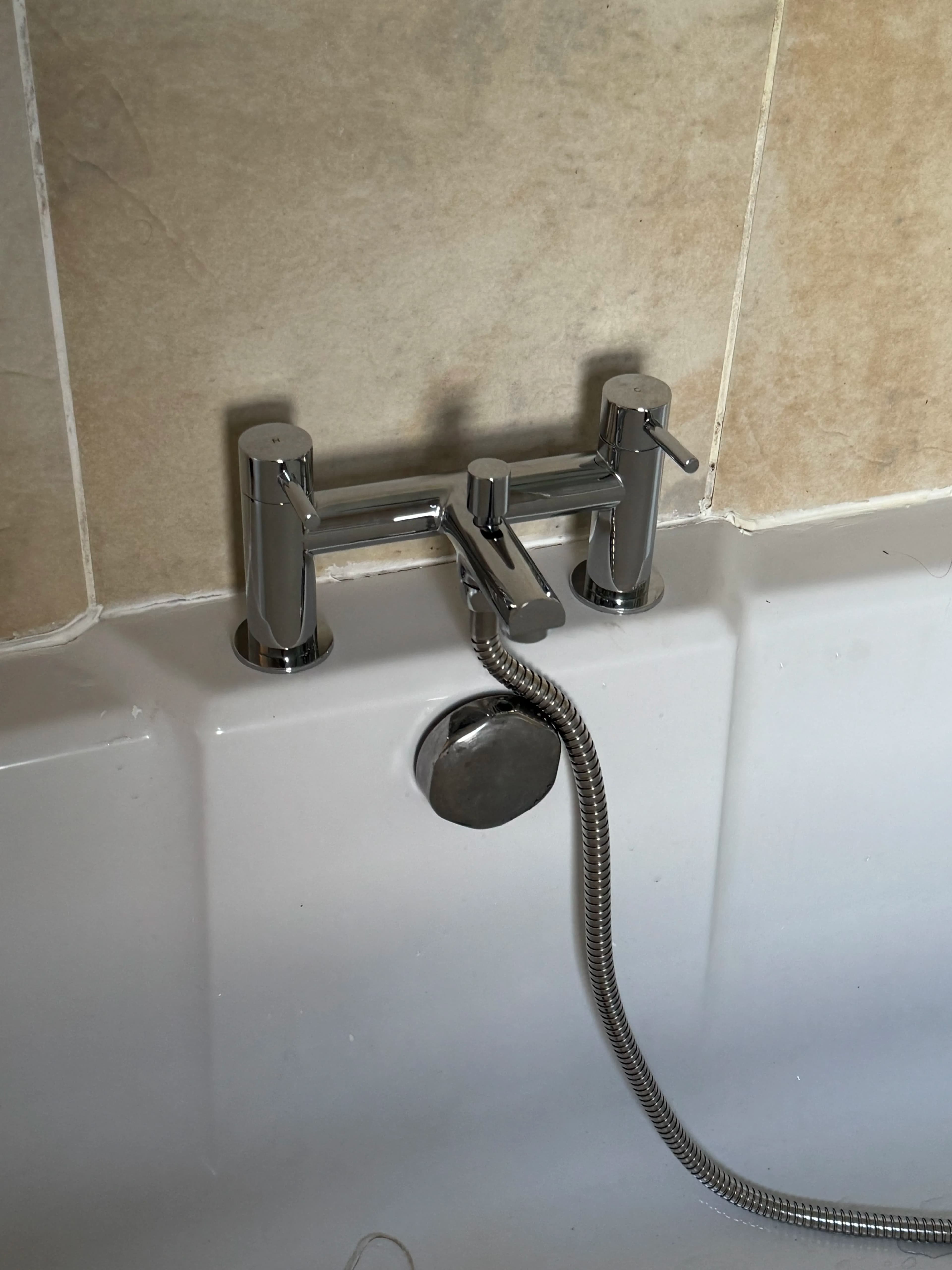 Chrome bath mixer tap with shower attachment